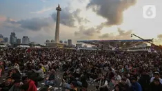 Ribuan orang memadati area HUT ke-78 Bhayangkara di Kawasan Monumen Nasional (Monas), Jakarta, Senin (1/7/2024). (Liputan6.com/Angga Yuniar)