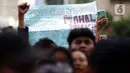 Para mahasiswa juga mengkritisi kebijakan pemerintah yang dianggap membebani masyarakat. (Liputan6.com/Helmi Fithriansyah)