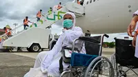 Sebelumnya, Kepala Kanwil Kemenag Aceh Azhari menyampaikan total jemaah haji Aceh kloter terakhir yang dipulangkan ke Tanah Air dari Arab Saudi sebanyak 254 jemaah. (Chaideer MAHYUDDIN/AFP)