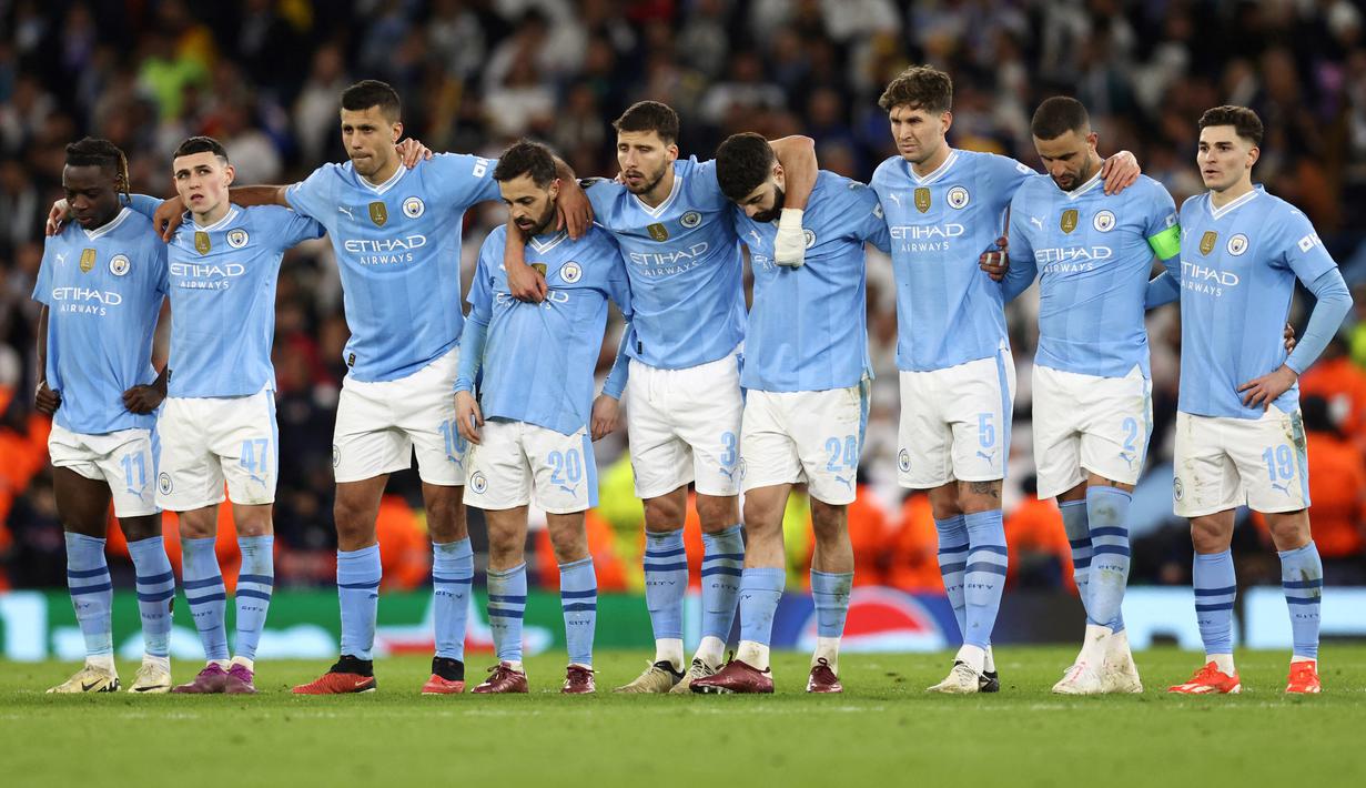 Sementara sang juara bertahan Man City harus tersingkir dan dipastikan gagal mengulang treble winners musim lalu. (Darren Staples / AFP)
