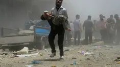 Ledakan yang diduga bom mobil terjadi di pusat kota Douma, dekat Damaskus, Suriah, Sabtu (19/07/14) (REUTERS/Yousef Albostany).