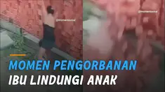 Gambaran sosok seorang ibu yang berani berkorban untuk anaknya terekam CCTV.