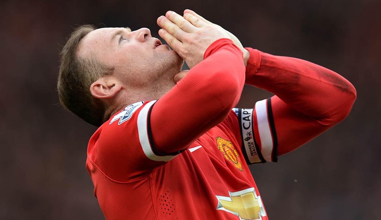 Manchester United akhirnya berhasil kembali ke Liga Champions. Setan Merah berada pada posisi empat klasemen akhir Premier League musim 2014/2015. (AFP/Oli Scarff)