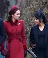 Kate Middleton dan Meghan Markle bersama suaminya Pangeran William dan Pangeran Harry saat menghadiri perayaan Natal kerajaan di Gereja St Mary Magdalene di Sandringham, Inggris (25/12). (AFP Photo/Paul Ellis)