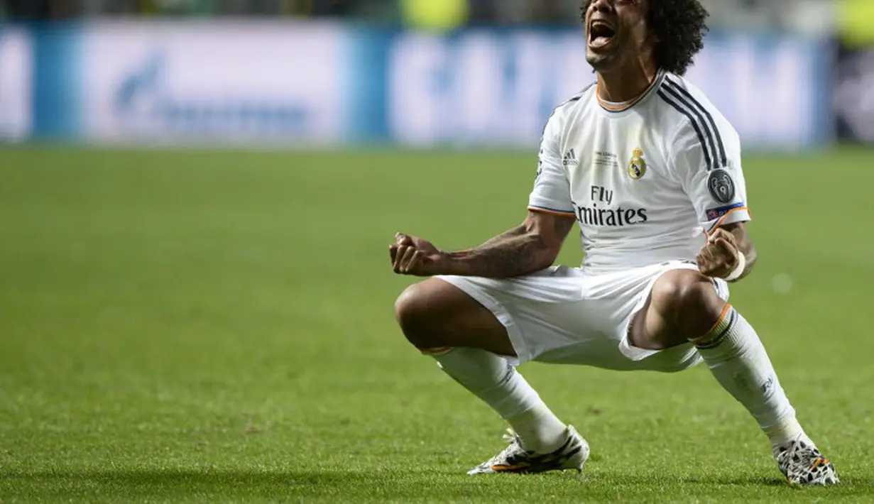 Selebrasi Marcelo usai mencetak gol ke gawang Atletico Madrid di Final Liga Champions, Estadio da Luz, Lisbon, Portugal, Minggu (25/5/2014) dinihari WIB (AFP PHOTO/FRANCK FIFE)