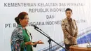 Menteri Kelautan dan Perikanan Susi Pudjiastuti memberi sambutan saat penandatanganan kerja sama di Jakarta (25/5). Dalam kesempatan tersebut Menteri Susi meyakinkan BNI, industri kelautan dan perikanan memiliki prospek cerah. (Liputan6.com/Angga Yuniar)