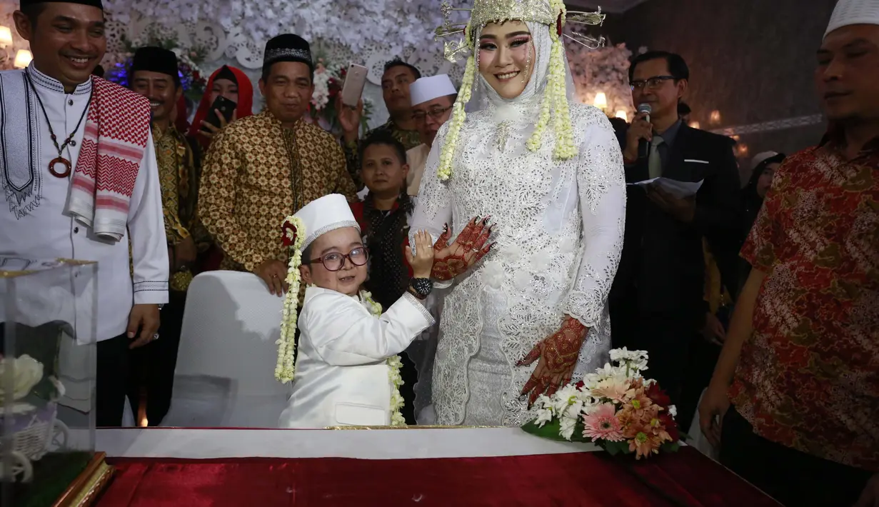 Daus Mini danSelviana Hana Wijaya
