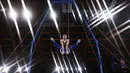 Atlet Komite Olahraga Rusia Aleksandr Kartsev bertanding dalam babak penyisihan senam artistik putra pada Olimpiade Tokyo 2020 di Ariake Gymnastics Center, Tokyo, Sabtu (24/7/2021). (Foto: AFP/Loic Venance)