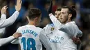 Para pemain Real Madrid merayakan gol Gareth Bale (kanan) saat melawan Getafe pada lanjutan La Liga Santander di Santiago Bernabeu stadium, Madrid, (3/3/2018). Real madrid menang 3-1. (AP/Francisco Seco)