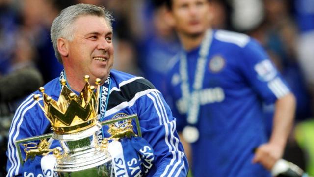 <span>Carlo Ancelotti mempersembahkan gelar Premier League 2009-2010 untuk Chelsea. (AFP/Adrian Dennis)</span>