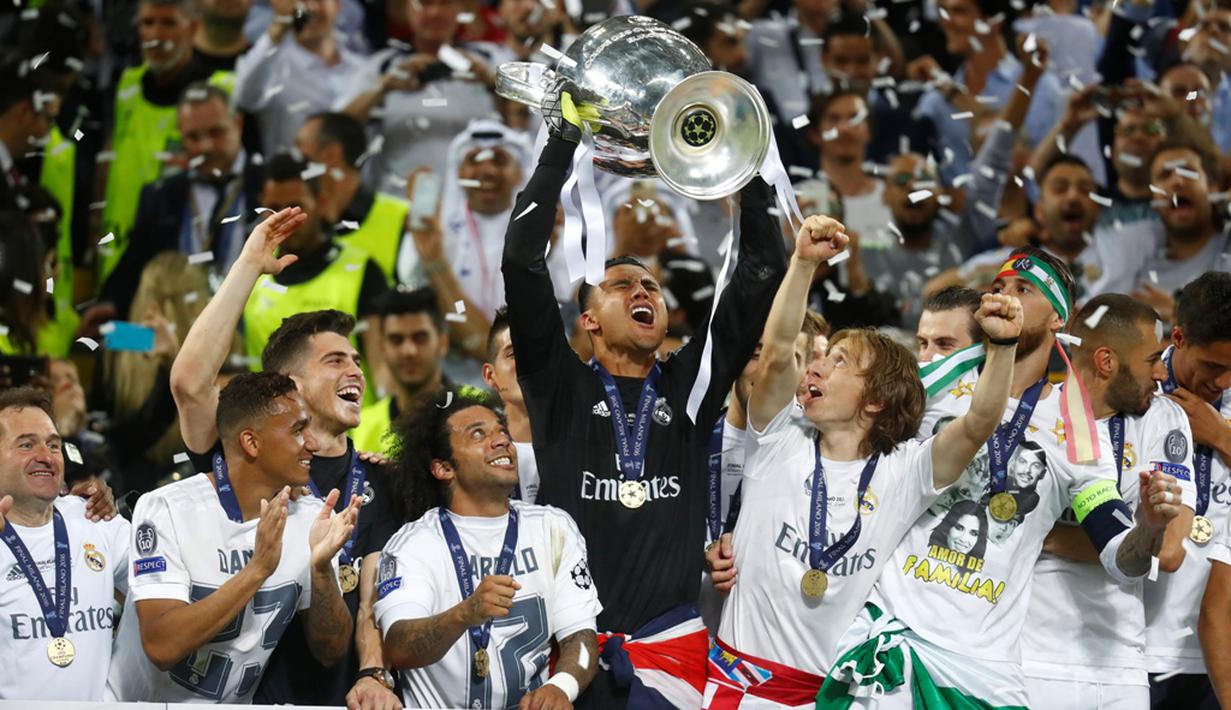 Pemain Real Madrid merayakan gelar Liga Champions ke-11 di Stadion San Siro, Milan, Minggu (29/5/2016) dini hari WIB. (Reuters/Kai Pfaffenbach)