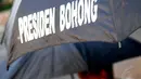 Para keluarga korban dan aktivis menuntut tutup buku hitam SBY di saat pelepasan menyambut presiden baru, Jakarta, (16/10/14). (Liputan6.com/Johan Tallo)