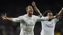 Pemain Real Madrid, Cristiano Ronaldo, merayakan gol ke gawang Wolfsburg pada laga Liga Champions di Stadion Santiago Bernabeu, Spanyol, Rabu (13/4/2016) dini hari WIB. Madrid lolos ke semifinal berkat menang agregat 3-2. (AFP/Gerard Julien)