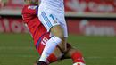 Aksi pemain Real Madrid, Lucas Vazquez (kanan) melewati adangan pemain Numancia, Grego pada laga Copa Del Rey di Nuevo Estadio Los Pajaritos stadium, Soria, (4/1/2018). Madrid menang 3-0. (AFP/Cesar Manso)