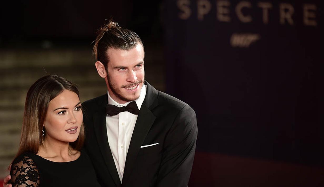 8. Bergabung dengan Manchester United akan membuat Gareth Bale semakin dekat dengan keluarganya. Hal yang menyenangkan bisa memiliki banyak waktu bersama anak perempuannya yang masih kecil. (AFP/Leon Neal)