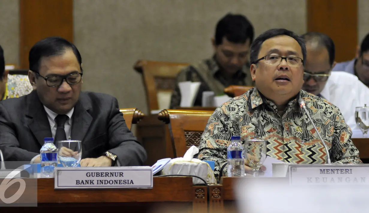 Gubernur BI,  Agus D.W. Martowardojo (kiri) dan Menkeu Bambang Brodjonegoro saat menghadiri Rapat Kerja dengan Komisi XI DPR di Kompleks Parlemen Senayan, Jakarta, Kamis (14/7). (Liputan6.com/Johan Tallo)