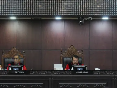 Ketua Hakim Mahkamah Konstitusi Anwar Usman memimpin jalannya sidang pleno keputusan sistem pemilu legislatif proporsional terbuka  di Gedung Mahkamah Konstitusi (MK), Jakarta, Kamis (15/6/2023). (merdeka.com/imam buhori)