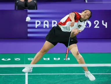 Pebulutangkis tunggal putri Indonesia, Gregoria Mariska Tunjung memastikan lolos ke babak 16 besar nomor tunggal putri cabor bulutangkis Olimpiade Paris 2024 setelah mencetak kemenangan kedua sekaligus menjadi juara Grup G. Dalam laga di Porte de la Chapelle Arena, Paris, Rabu (31/7/2024), Jorji berhasil mengunci kemenangan dua gim langsung 21-12, 21-18 atas wakil Republik Ceska, Tereza Svabikova. (Dok. NOC Indonesia/Naif Muhammad Al'as)