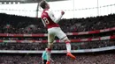 Pemain Arsenal, Aaron Ramsey masuk dalam daftar pemberi assist terbanyak di Premier League, hingga pekan ke-16 Ramsey sudah mengoleksi enam assist untuk Arsenal. (AFP/Daniel Leal-Olivas)