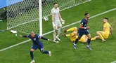 Cody Gakpo dan Donyell Malen tampil cemerlang saat membawa Timnas Belanda menggilas Rumania pada babak 16 besar Euro 2024 di Fussball Arena, Munchen, Selasa (2/7/2024). (AFP/Thomas Kienzle)