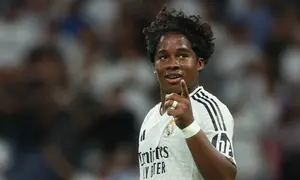 Ekspresi penyerang Real Madrid, Endrick, setelah mencetak gol ke gawang VFB Stuttgart pada matchday pertama Liga Champions 2024/2025 di Santiago Bernabeu, Rabu (18/9/2024) dini hari WIB. (Pierre-Philippe Marcou/AFP)