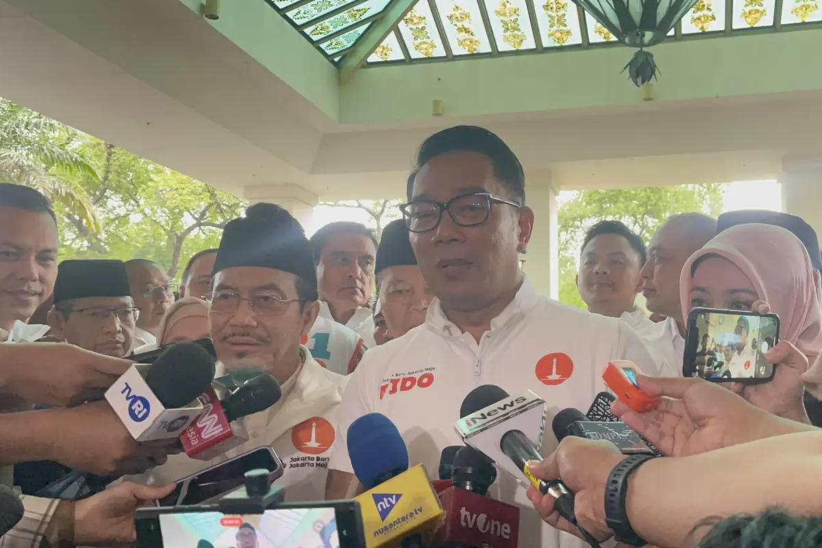 Calon gubernur dan wakil gubernur Jakarta nomor urut 1 Ridwan Kamil-Suswono di Hotel Borobudur, Jakarta Pusat, Sabtu (23/11/2024). (Liputan6.com/Winda Nelfira)