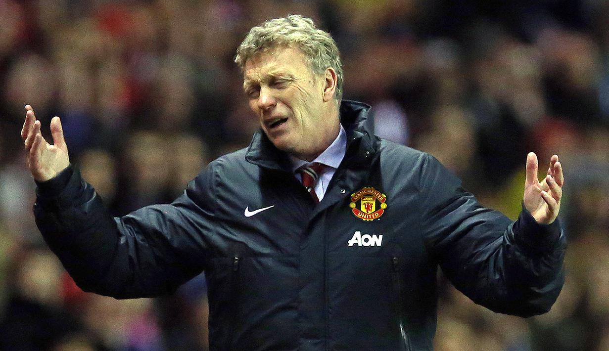 David Moyes ditunjuk langsung oleh Sir Alex Ferguson untuk menggantikan posisinya sebagai manajer Manchester United. Moyes mengawali musim yang sulit di Old Trafford karena tidak mendapatkan dukungan dari manajemen di bursa transfer. Hal tersebut membuatnya hanya bertahan 9 bulan. (AFP/Ian Macnicol)