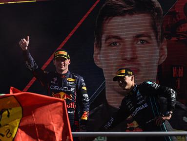 Pembalap asal Belanda dari tim Red Bull, Max Verstappen berhasil memenangi balapan F1 GP Italia 2022 yang digelar di Sirkuit Monza, Minggu (11/9/2022) malam WIB. Kemenangan tersebut menjadi podium juara kelima secara beruntun di musim 2022 yang kian mendekatkannya dengan titel juara dunia. (AFP/Miguel Medina)