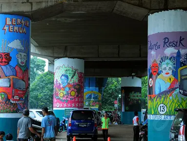 Festival Mural yang diadakan di Stasiun Gambir, Jakarta, Sabtu (30/8/14). (Liputan6.com/Faisal R Syam) 