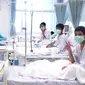 Tim sepak bola remaja Thailand dirawat di rumah sakit di Chiang Rai, Thailand, Rabu (11/7). Tim SEAL AL Thailand berhasil mengevakuasi seluruh korban dari dalam gua. (Thai Government Public Relations Department (PRD)and Government Spokesman Bureau/AFP)