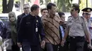 Gubernur Sumatera Utara Gatot Pujo Nugroho bersama istrinya, Evy Susanti memenuhi panggilan penyidik KPK, Jakarta, Senin (3/8/2015) Gatot diperiksa sebagai tersangka kasus dugaan suap hakim PTUN Medan. (Liputan6.com/Helmi Afandi)