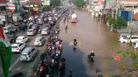 Banjir di Jalan Abdullah Syafei (Liputan6.com/ Raden Trimutia Hatta)
