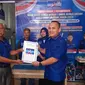 Rezki Wirmandi saat mengembalikan berkas pendaftaran di Demokrat Bandar Lampung. Foto: (Liputan6.com/Ardi)