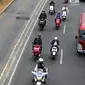 Konvoi sepeda motor listrik jelang jadwal pelaksanaan balap mobil listrik atau Formula E 2020 di kawasan Sudirman, Jakarta, Jumat (20/9/2019). Formula E juga dapat dipakai sebagai kampanye kendaraan ramah lingkungan. (Liputan6.com/Fery Pradolo)