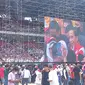 Presiden Jokowi menghadiri acara Nusantara Bersatu yang dihadiri ribuan relawan di Stadion Gelora Bung Karno (GBK), Senayan, Jakarta. (Merdeka.com/Genantan Saputra)