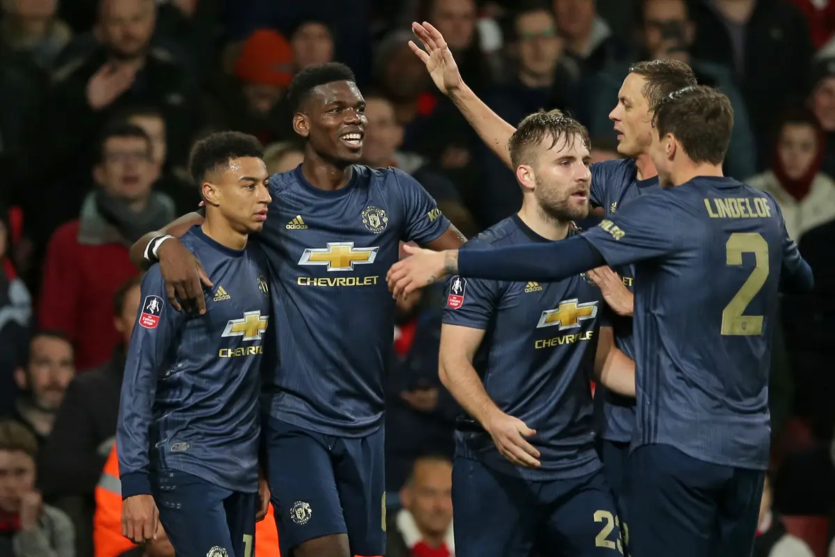 Para pemain Manchester United merayakan gol yang dicetak Jesse Lingard ke gawang Arsenal. (AFP/Daniel Leal-Olivas)