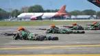 Sejumlah personel TNI AU bersiap melakukan tembakan saat latihan serangan pesawat di Lanud Sultan Iskandar Muda, Blang Bintang, Provinsi Aceh, Kamis (19/2/2020). (CHAIDEER MAHYUDDIN/AFP)