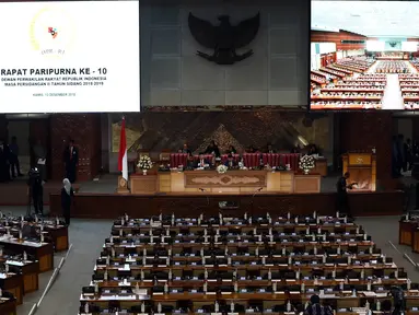 Suasana Rapat Paripurna DPR RI ke-10 Masa Persidangan II Tahun 2018/2019 di Jakarta, Kamis (13/12). Rapat Paripurna didominasi kursi kosong. (Liputan6.com/JohanTallo)