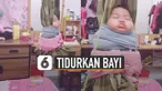 Bukannya ketakutan, sang bayi malah terlelap dan nyaman.