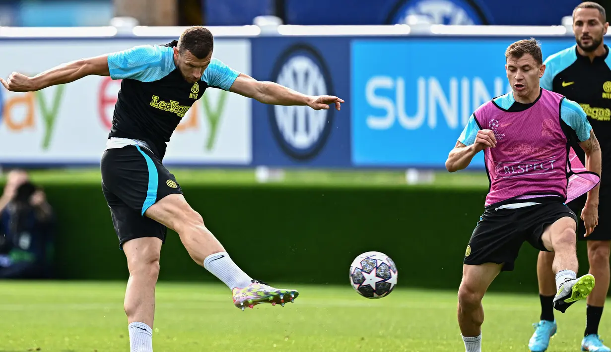 <p>Inter Milan melenggang ke final setelah berhasil mengkandaskan rival sekota, AC Milan, di babak empat besar. (AFP/Gabriel Bouys)</p>