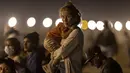 Mulai Jumat, para migran sekali lagi dapat mengajukan klaim suaka dan kasus mereka ditangani melalui sistem hukum, sebuah proses yang dapat memakan waktu beberapa tahun. (Photo by JOHN MOORE / GETTY IMAGES NORTH AMERICA / Getty Images via AFP)