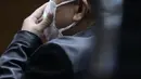 Terdakwa dugaan tindak pidana korupsi pengadaan tanah di Munjul, Rudy Hartono Iskandar saat mengikuti sidang pembacaan tuntutan di Pengadilan Tipikor Jakarta, Kamis (10/2/2022). Rudy Hartono Iskandar dituntut pidana penjara selama 7 tahun dan denda 500 juta. (Liputan6.com/Helmi Fithriansyah)