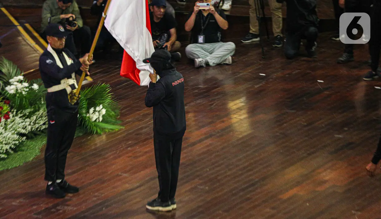 Sementara itu, CdM Basuki Hadimuljono dalam laporannya menyebut Tim Indonesia akan mengikuti 30 cabor, 33 federasi nasional, dengan total atlet 413 atlet (235 putra, 178 putri). (Liputan6.com/Faizal Fanani)