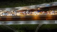 Foto udara ini menunjukkan kendaraan yang terjebak kemacetan di&nbsp; Jalan Tol Jakarta - Cikampek di Karawang, Jawa Barat pada 28 April 2022. Lalu lintas di Jalan Tol Jakarta-Cikampek mengalami kemacetan panjang memasuki puncak arus mudik Lebaran 2022. (BAY ISMOYO / AFP)