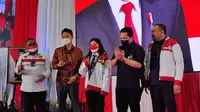 Menteri BUMN Erick Thohir saat memberikan pengarahan kepada 2.686 Calon Pekerja Migran Indonesia (CPMI) di Cibubur, Senin (12/09/2022). (Liputan6.com/Achmad Sudarno)