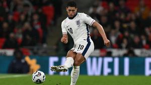 Gelandang Timnas Inggris, Jude Bellingham, tampil selama 90 menit penuh saat timnya menang 2-0 atas Albania pada laga perdana Grup K kualifikasi Piala Dunia 2026 di Stadion Wembley, London, Sabtu (22/3/2025) dini hari WIB. (AFP/Glyn KIRK)