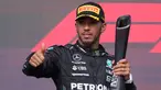 Pembalap Mercedes Lewis Hamilton merayakan di podium usai balapan mobil F1 GP AS 2023 di Sirkuit Amerika, Austin, Texas, Amerika Serikat, Minggu (22/10/2023). Lewis Hamilton resmi didiskualifikasi dari balapan F1 GP AS 2023. (AP Photo/Darron Cummings)