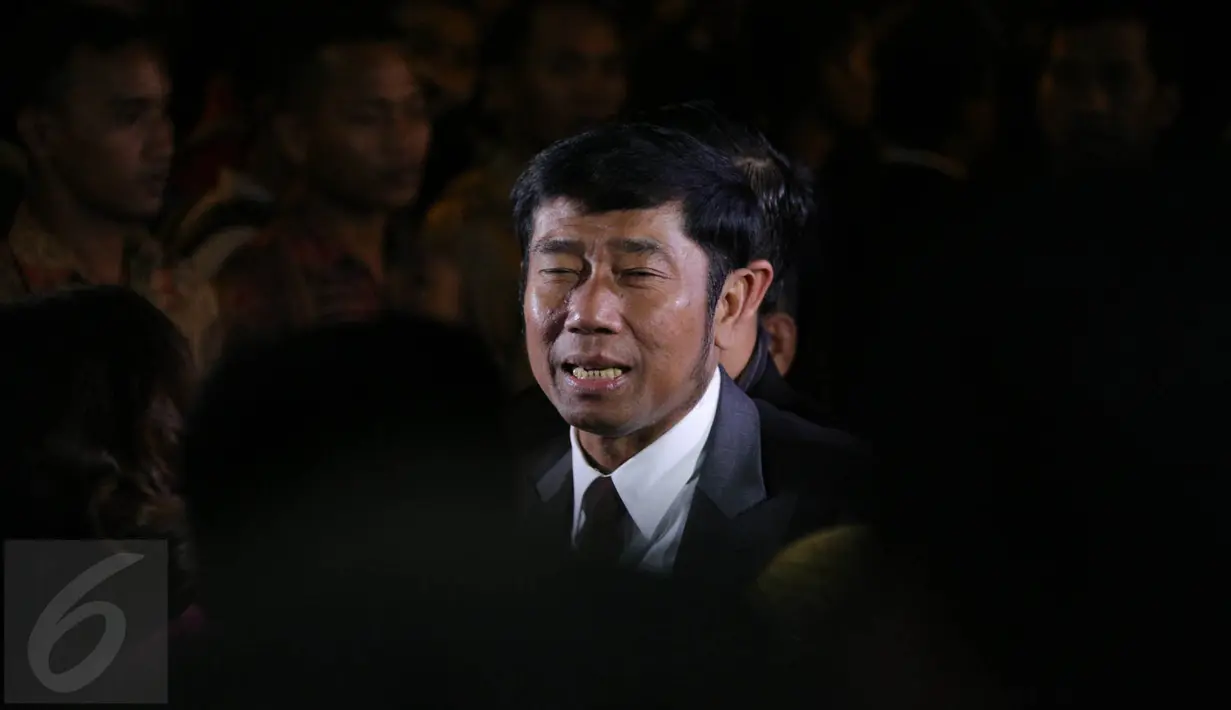 Haji Lulung saat menghadiri resepsi pernikahan Acara resepsi pernikahan Gibran Rakabuming Raka dengan Selvi Ananda, Solo, Kamis (11/6/2015). Resepsi pernikahan malam hari ini dihadiri oleh para tamu VIP dan VVIP. (Liputan6.com/Faizal Fanani)