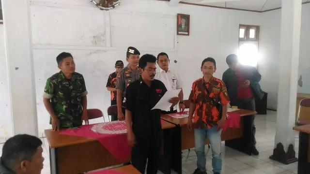 Ormas GMBI dan PP bersepakat untuk berdamai usai nyaris bentrok akibat salah paham. (Foto: Liputan6.com/Polres Pemalang/Muhamad Ridlo)