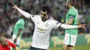 Henrikh Mkhitaryan mencetak satu-satunya gol bagi kemenangan Manchester United melawan Saint-Etienne pada leg kedua Babak 32 besar Liga Europa di Geoffroy Guichard stadium, Saint-Etienne, (22/2/2017). (AP Photo/Laurent Cipriani)